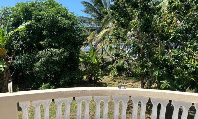 Priory House | Relax in Tropical Paradise Villa with Family-Friendly Amenities