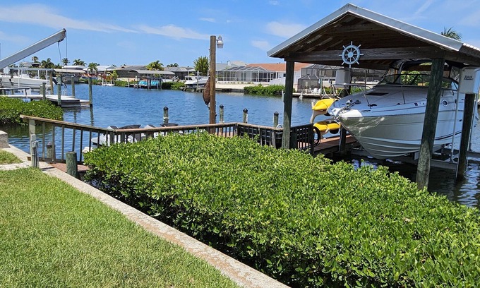 Apollo Beach House | Tropical Waterfront Pool Home, Private Dock, Kayaks, Direct Access to Tampa Bay!