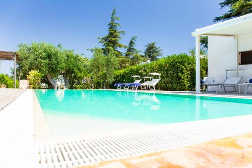 Impalata House | Elegant Trulli del Capo: Oceanfront, 4-Star Retreat Awaits