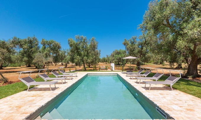 San Michele Salentino Cottage | Discover Trullo Palma: A Unique Family-Friendly Retreat
