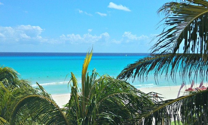 Playacar Fase I Condo | Oceanfront Penthouse Retreat in Playa del Carmen, Rated 10/10