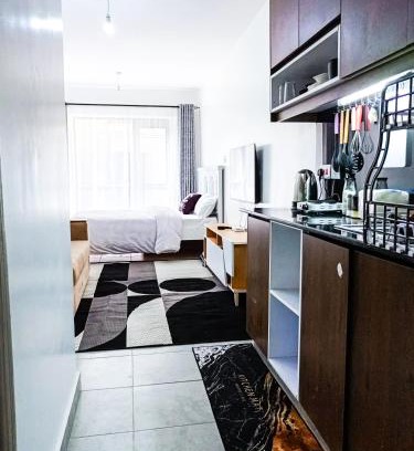 Ongata Rongai Apartment | Discover Tsavo Immaqulate Studio: Poolside Family Haven