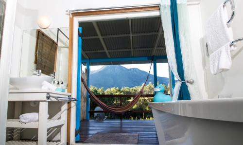 Storms River Cabin | Discover Tsitsikhaya Lodge: Oceanfront Retreat with Spa