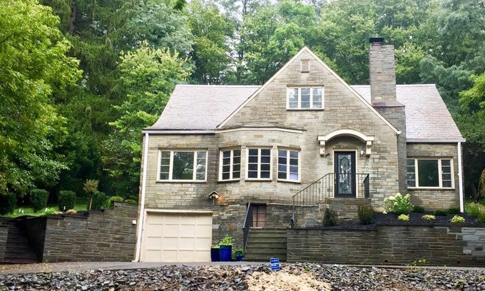 Ithaca House | Elegant Tudor Treasure with Stone Terrazza & Spa Access