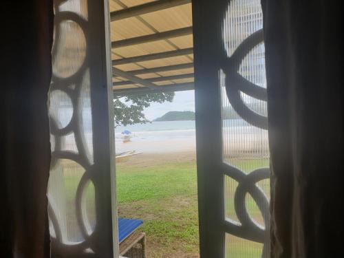 Puerto Princesa House | Beachfront Oasis: Tupi's Oceanview Home with Great Amenities