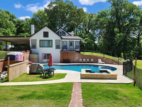 Raleigh House | Historic Turn of the Century Estate with Secluded Sauna
