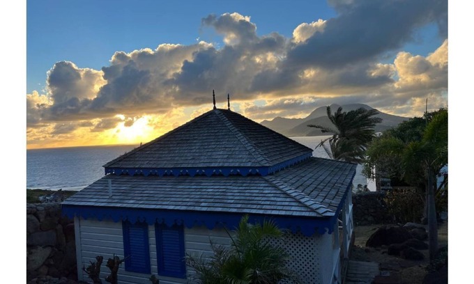 Frigate Bay Cabin | Charming Turtle Beach White House: Romantic Cottage Retreat