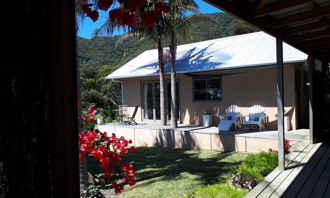 Whangarei Heads Ski Chalet | Idyllic Twin Palms Ocean Beach with Breakfast & Pet-Friendly Stays