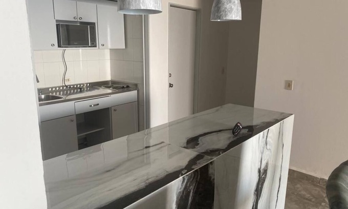 Club Deportivo Apartment | Comfortable Twin Towers Double Apartment with Pool Access
