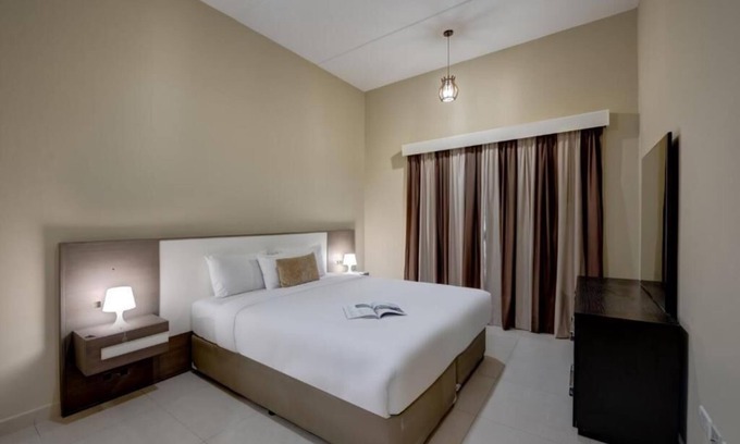 Dubai Investment Park Hotel | Two Bedroom Apartment Near Dunes Village with Pool Access