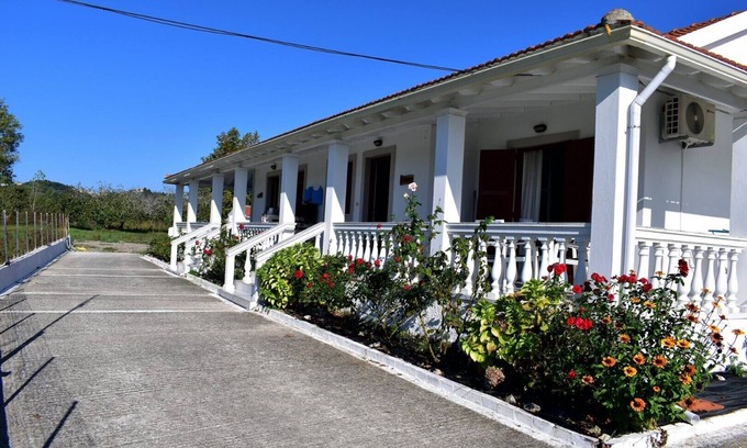 Ag. Georgios Apartment | Two Bedroom Apartment Steps from a Pristine Beach