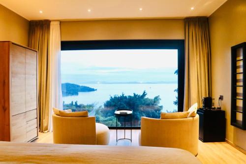 Gisenyi Cabin | Discover Ubucuti Lodge: Oceanfront Bliss and Spa Retreat