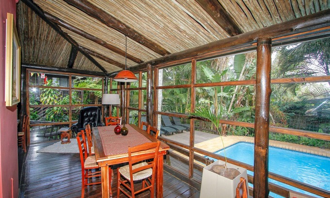 St. Lucia Bed & Breakfast | Relax at Umlilo Lodge: 4-Star Stay with Ocean Views