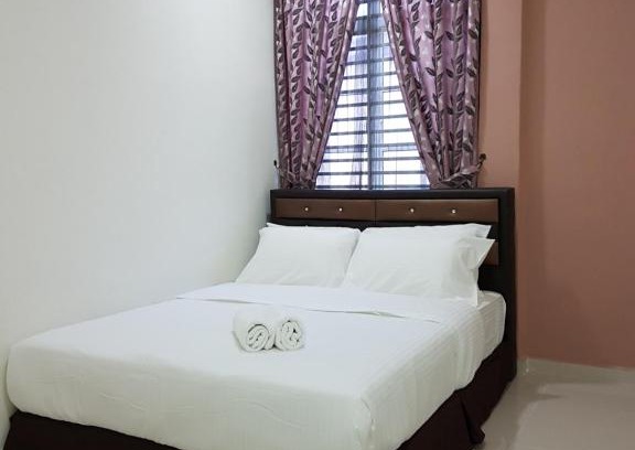 Kampung Batu Tiong House | Cozy Ummi Guesthouse - Child-Friendly Retreat with Great Reviews