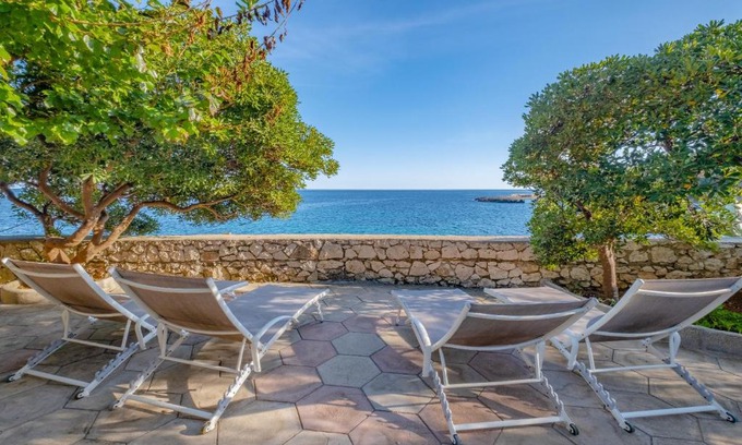 Marina di Marittima Villa | Beachfront Bliss at Un' Altalena sul Mare - Pet Friendly Stays