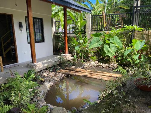 Valencia House | Under the mango tree at Klipp Residence