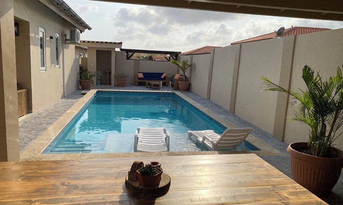 Oranjestad House | Experience Unique Aruban Style Home with Pool & Ocean Views
