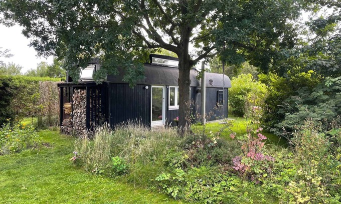 Smidstrup Strand Cottage | Quirky Circus Wagon: Oceanfront Oasis Near the Beach