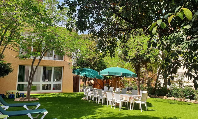 La Fosca House | Cozy Retreat with Garden Just Steps from La Fosca Beach