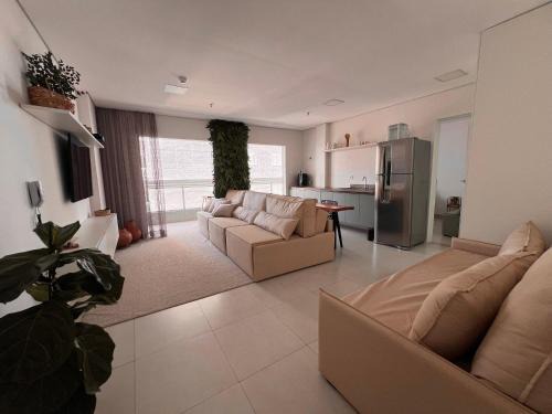 Boqueirao Apartment | Experience Unitá Praia Grande Boqueirão with Ocean Views