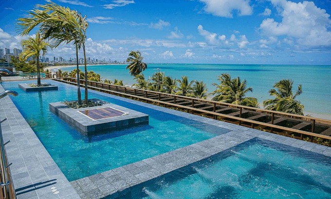 Cabo Branco Apartment | Cozy Unity #110: Oceanfront Apartment with Pool & Hot Tub