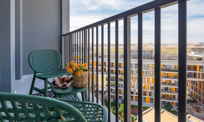 Dubai Investment Park Apartment | Elegant 2BR Retreat with Pool and Community Views