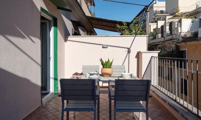 Monti Apartment | Experience Urbana Rooftop: Family-Friendly Getaway with Views