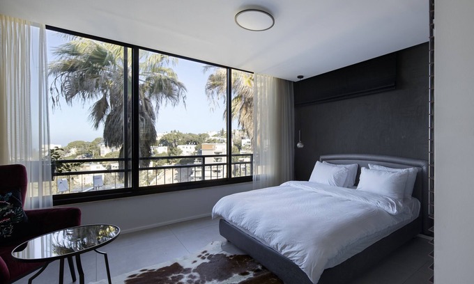 Haifa Apartment | Stylish Urbanica Carmel: Spa, Breakfast & Family-Friendly