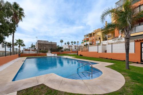 La Chullera Apartment | Explore Urbanización Jardines del Mar with Oceanfront Pool