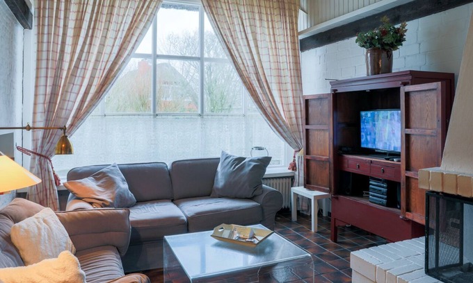 Utersum Apartment | Experience a Unique Stay in a Former Barn Retreat