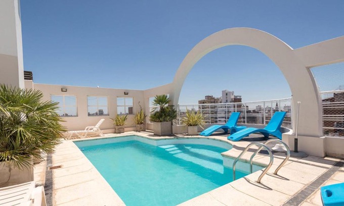 Centro Apartment | Discover Urquiza Apart Hotel & Suites: Pet Friendly & Pool