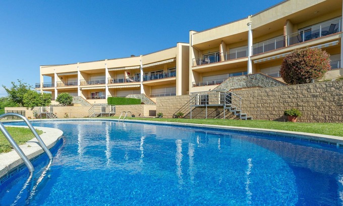 El Mas Isaac Apartment | Sun Village: Top-Rated Duplex with Pool & Family Amenities