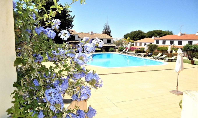 Quarteira Ski Chalet | Relax at V2 Vilar Jardim: Pool, WiFi & Pet-Friendly Fun