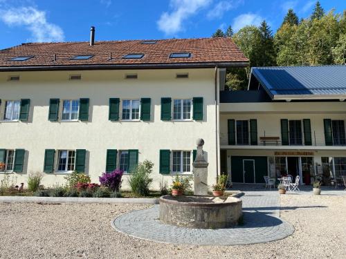 Areuse Apartment | Experience the Farm Stay at Ferme des Buffles - 9.5/10!