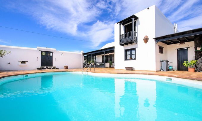 San Bartolome Villa | Inviting Villa with Pool, Balcony and Modern Amenities