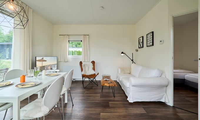 Suesel House | Vacation home by the lake in Süsel with terrace and modern furnishings