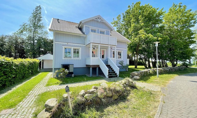 Wiek House | Waterfront Vacation Home in Wiek on Rügen with Pool