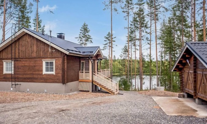 Tiainen House | Relaxing Retreat at Hapero by Interhome with Spa & Lake View