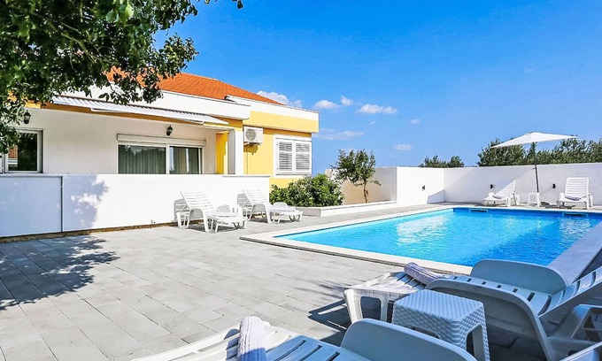 Podgradina House | Explore Karlo by Interhome: Oceanfront Bliss and Spa Retreat