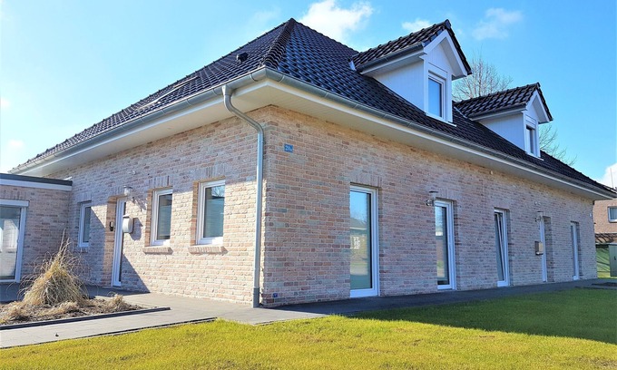 Rhauderfehn Apartment | Inviting Vacation Home Südwind: Family-Friendly Comfort