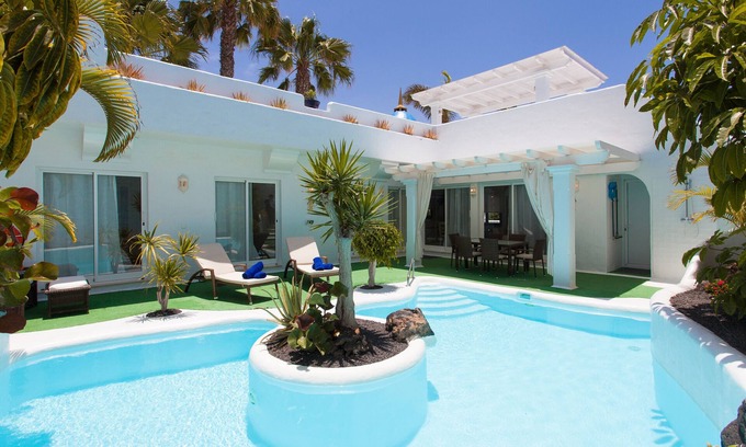 Geafond Villa | Discover Villa 82: Poolside Retreat with Mountain Views