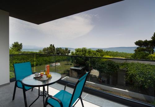 Kastel Stafilic Apartment | Oceanfront Bliss at Vacation On Apartments - Guest Rated 9.9