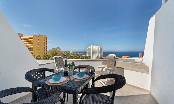 San Eugenio Apartment | Ocean View Studio 'Las Flores 407' with Shared Pool & Wi-Fi