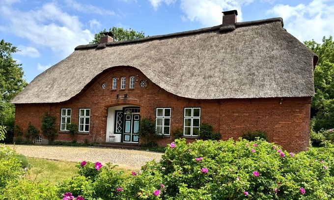 Kohn House | Vacations under a thatched roof - not far from Lake Selent and the Baltic Sea