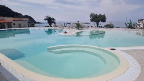 Ricadi Apartment | Discover ValGiuSi Resort: Oceanfront Paradise Awaits