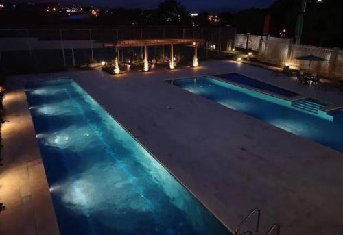 Rincon de Sabanilla Apartment | Inviting Valley Views with Pool and Family-Friendly Vibes