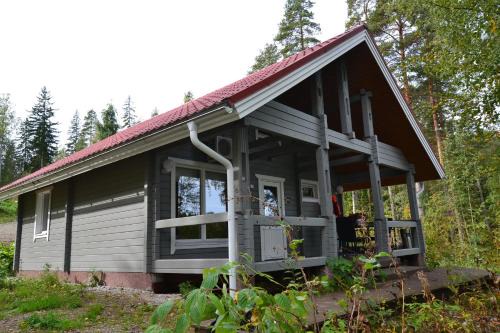 Enonkoski Villa | Valteri: Oceanfront Escape with Private Beach Access