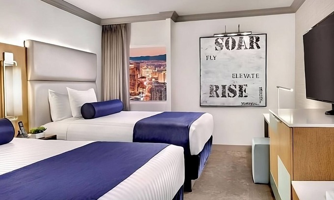 Gateway District Hotel | Budget-Friendly Retreat with Pools, Game Room & Parking