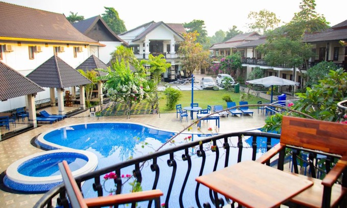Vang Vieng Hotel | Discover Vang Vieng Diamond Resort: Pet-Friendly Retreat