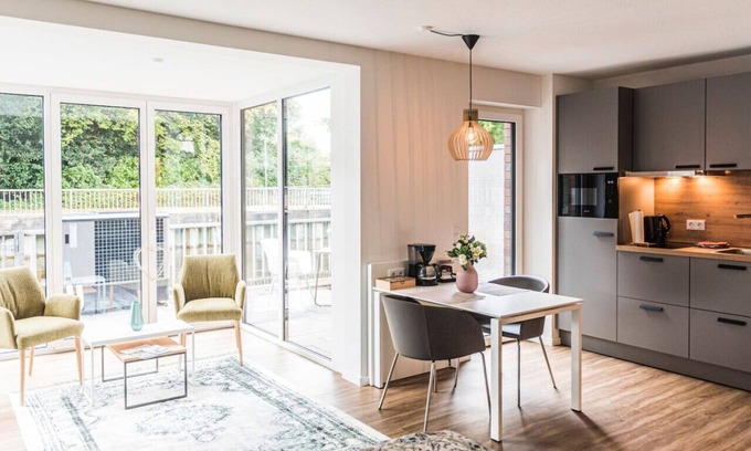 Nordhorn Apartment | "Vechte-Garten" new build with a view of the water & PP